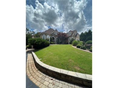 Absolutely stunning home in the prestigious Eagles Landing on Eagles Landing Country Club in Georgia - for sale on GolfHomes.com, golf home, golf lot