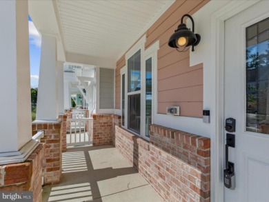 Welcome to 22198 Dune Circle, a gracious townhome villa offering on The Peninsula Golf and Country Club in Delaware - for sale on GolfHomes.com, golf home, golf lot