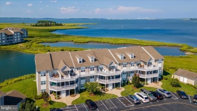 Direct bay views abound from this beautiful 2-story condo in on Bethany Bay Golf Club in Delaware - for sale on GolfHomes.com, golf home, golf lot