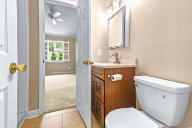 Nestled on a quiet a cul-de-sac surrounded by lush, mature trees on Island Green Golf Club in South Carolina - for sale on GolfHomes.com, golf home, golf lot