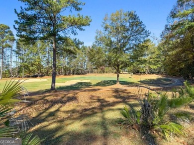 Experience unparalleled luxury in this stunning all-brick estate on Canongate At Heron Bay in Georgia - for sale on GolfHomes.com, golf home, golf lot