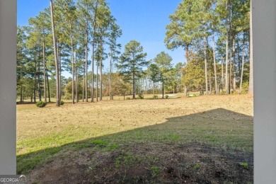 Experience unparalleled luxury in this stunning all-brick estate on Canongate At Heron Bay in Georgia - for sale on GolfHomes.com, golf home, golf lot