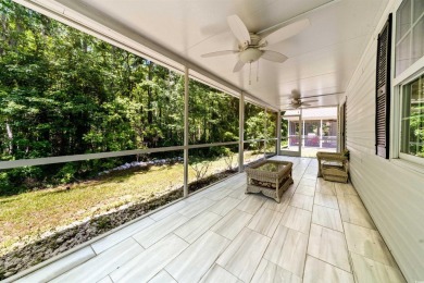 Nestled on a quiet a cul-de-sac surrounded by lush, mature trees on Island Green Golf Club in South Carolina - for sale on GolfHomes.com, golf home, golf lot