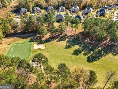 Experience unparalleled luxury in this stunning all-brick estate on Canongate At Heron Bay in Georgia - for sale on GolfHomes.com, golf home, golf lot