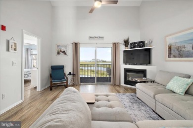 Direct bay views abound from this beautiful 2-story condo in on Bethany Bay Golf Club in Delaware - for sale on GolfHomes.com, golf home, golf lot