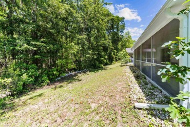 Nestled on a quiet a cul-de-sac surrounded by lush, mature trees on Island Green Golf Club in South Carolina - for sale on GolfHomes.com, golf home, golf lot