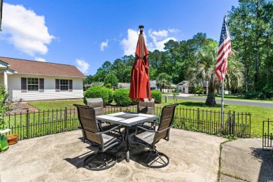 Nestled on a quiet a cul-de-sac surrounded by lush, mature trees on Island Green Golf Club in South Carolina - for sale on GolfHomes.com, golf home, golf lot