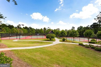 Experience unparalleled luxury in this stunning all-brick estate on Canongate At Heron Bay in Georgia - for sale on GolfHomes.com, golf home, golf lot