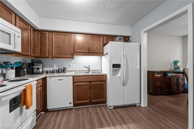 This inviting end-unit townhome offers 2 spacious bedrooms and 2 on Heather Hills Golf Course in North Carolina - for sale on GolfHomes.com, golf home, golf lot
