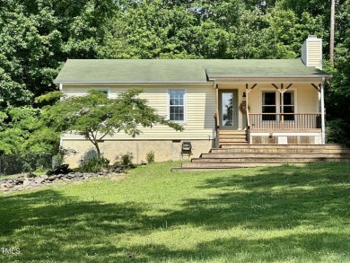 Welcome to Lake Royale! This adorable 3-bedroom home is situated on River Golf and County Club at Lake Royale in North Carolina - for sale on GolfHomes.com, golf home, golf lot