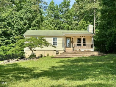 Welcome to Lake Royale! This adorable 3-bedroom home is situated on River Golf and County Club at Lake Royale in North Carolina - for sale on GolfHomes.com, golf home, golf lot