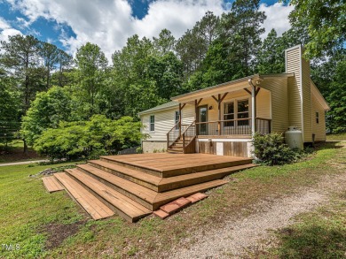 Welcome to Lake Royale! This adorable 3-bedroom home is situated on River Golf and County Club at Lake Royale in North Carolina - for sale on GolfHomes.com, golf home, golf lot