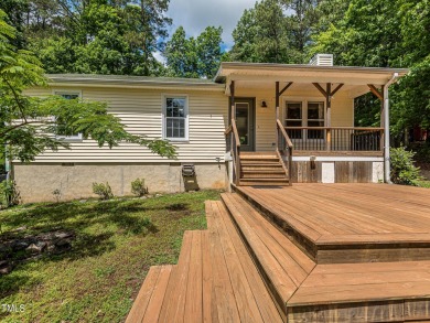 Welcome to Lake Royale! This adorable 3-bedroom home is situated on River Golf and County Club at Lake Royale in North Carolina - for sale on GolfHomes.com, golf home, golf lot
