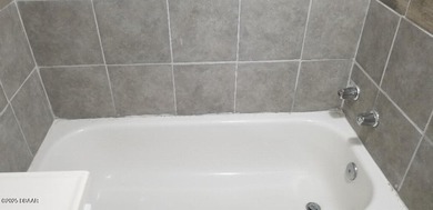 Welcome to your renovated, 3 bedroom, 1 bath house located on Riviera Country Club in Florida - for sale on GolfHomes.com, golf home, golf lot