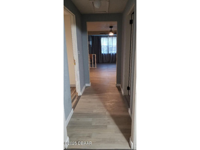 Welcome to your renovated, 3 bedroom, 1 bath house located on Riviera Country Club in Florida - for sale on GolfHomes.com, golf home, golf lot