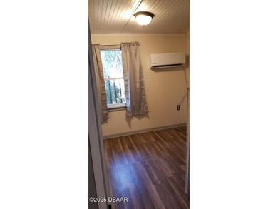 Welcome to your renovated, 3 bedroom, 1 bath house located on Riviera Country Club in Florida - for sale on GolfHomes.com, golf home, golf lot