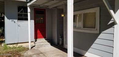 Welcome to your renovated, 3 bedroom, 1 bath house located on Riviera Country Club in Florida - for sale on GolfHomes.com, golf home, golf lot