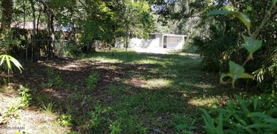 Welcome to your renovated, 3 bedroom, 1 bath house located on Riviera Country Club in Florida - for sale on GolfHomes.com, golf home, golf lot