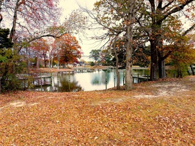 Welcome to Tee & Tide, a waterfront retreat where your days on Indian Creek Yacht and Country Club in Virginia - for sale on GolfHomes.com, golf home, golf lot
