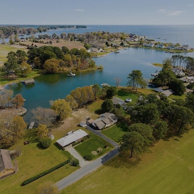 Welcome to Tee & Tide, a waterfront retreat where your days on Indian Creek Yacht and Country Club in Virginia - for sale on GolfHomes.com, golf home, golf lot