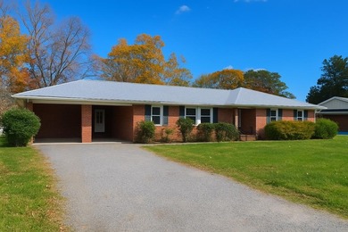 Welcome to Tee & Tide, a waterfront retreat where your days on Indian Creek Yacht and Country Club in Virginia - for sale on GolfHomes.com, golf home, golf lot