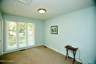 Located on the 18th green at Wilson Country Club, this beautiful on Wilson Country Club in North Carolina - for sale on GolfHomes.com, golf home, golf lot