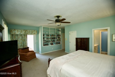 Located on the 18th green at Wilson Country Club, this beautiful on Wilson Country Club in North Carolina - for sale on GolfHomes.com, golf home, golf lot