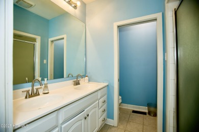 Located on the 18th green at Wilson Country Club, this beautiful on Wilson Country Club in North Carolina - for sale on GolfHomes.com, golf home, golf lot