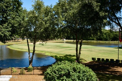 Located on the 18th green at Wilson Country Club, this beautiful on Wilson Country Club in North Carolina - for sale on GolfHomes.com, golf home, golf lot