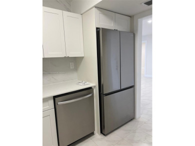 Completely renovated, no single detail overlooked. Kitchen and on Pembroke Lakes Golf Club in Florida - for sale on GolfHomes.com, golf home, golf lot