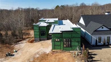 This newly constructed luxury home in the prestigious Blessings on Blessings Golf Club in Arkansas - for sale on GolfHomes.com, golf home, golf lot