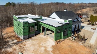 This newly constructed luxury home in the prestigious Blessings on Blessings Golf Club in Arkansas - for sale on GolfHomes.com, golf home, golf lot