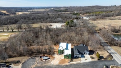 This newly constructed luxury home in the prestigious Blessings on Blessings Golf Club in Arkansas - for sale on GolfHomes.com, golf home, golf lot