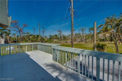 Large lot with two story home in Pineland, close to Pineland on Alden Pines Golf Club in Florida - for sale on GolfHomes.com, golf home, golf lot