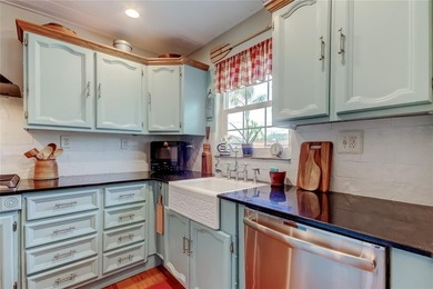 Under contract-accepting backup offers. Tucked into one of on The Dunedin Country Club in Florida - for sale on GolfHomes.com, golf home, golf lot