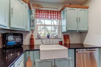 Under contract-accepting backup offers. Tucked into one of on The Dunedin Country Club in Florida - for sale on GolfHomes.com, golf home, golf lot