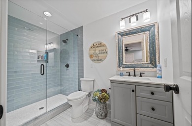 Stunning Lakefront Home in Gated Harbor Club - Remodeled from on Harbor Club Golf and Country Club in Georgia - for sale on GolfHomes.com, golf home, golf lot