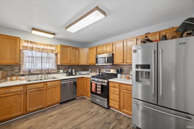 Welcome to this beautifully maintained 3-bedroom, 2-bath home on The Eagle Pointe Golf Resort in Indiana - for sale on GolfHomes.com, golf home, golf lot