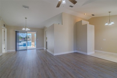 Under contract-accepting backup offers. TOTALY REMODELED POOL & on Ocala Palms Golf and Country Club in Florida - for sale on GolfHomes.com, golf home, golf lot