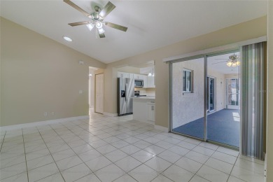Under contract-accepting backup offers. TOTALY REMODELED POOL & on Ocala Palms Golf and Country Club in Florida - for sale on GolfHomes.com, golf home, golf lot