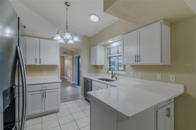 Under contract-accepting backup offers. TOTALY REMODELED POOL & on Ocala Palms Golf and Country Club in Florida - for sale on GolfHomes.com, golf home, golf lot