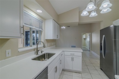 Under contract-accepting backup offers. TOTALY REMODELED POOL & on Ocala Palms Golf and Country Club in Florida - for sale on GolfHomes.com, golf home, golf lot