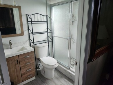 WOW!!! RARELY AVAILABLE REMODLED GROUND FLOOR CORNER UNIT on  in Florida - for sale on GolfHomes.com, golf home, golf lot