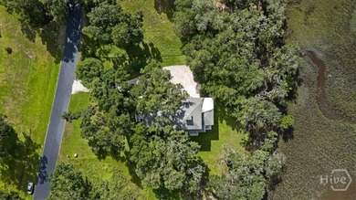 Introducing this exceptional 3,000-square-foot home in the on Sapelo Hammock Golf Club in Georgia - for sale on GolfHomes.com, golf home, golf lot