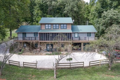 The essence of Tennessee Living! Honest Abe Log Home perched on on Hidden Valley Golf and Country Club in Tennessee - for sale on GolfHomes.com, golf home, golf lot