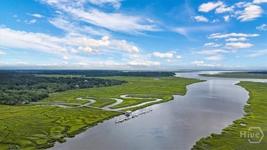Introducing this exceptional 3,000-square-foot home in the on Sapelo Hammock Golf Club in Georgia - for sale on GolfHomes.com, golf home, golf lot