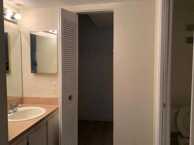 Specious 2 bed 2 bath ground floor unit with beautiful lake view on Palm-Aire Country Club and Resort - Palms in Florida - for sale on GolfHomes.com, golf home, golf lot