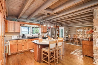 The essence of Tennessee Living! Honest Abe Log Home perched on on Hidden Valley Golf and Country Club in Tennessee - for sale on GolfHomes.com, golf home, golf lot