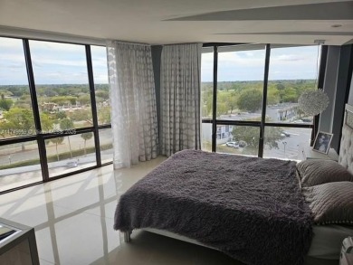 SPECTACULAR totally remodeled unit at The Towers of Kendale on Miccosukee Golf and Country Club in Florida - for sale on GolfHomes.com, golf home, golf lot