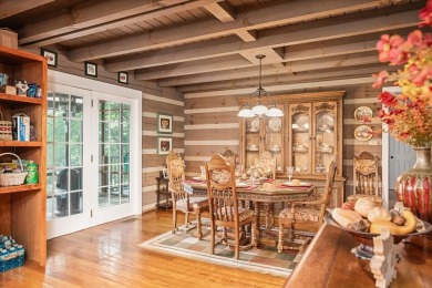 The essence of Tennessee Living! Honest Abe Log Home perched on on Hidden Valley Golf and Country Club in Tennessee - for sale on GolfHomes.com, golf home, golf lot